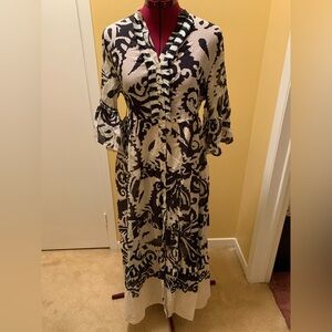 NWOT Motel brand print dress with lots of details